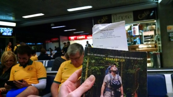 My copy, Inklings receipt as bookmark, in the wilds of a Brazilian airport. (Pictured in front of the closed airport bookshop.)
