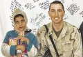 Trent Reedy in Afghanistan with the girl he helped get surgery