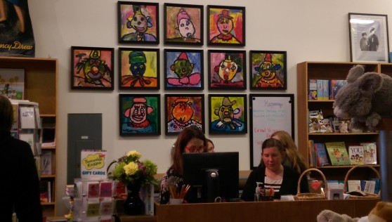 Childrens' art is prominently featured at the front desk