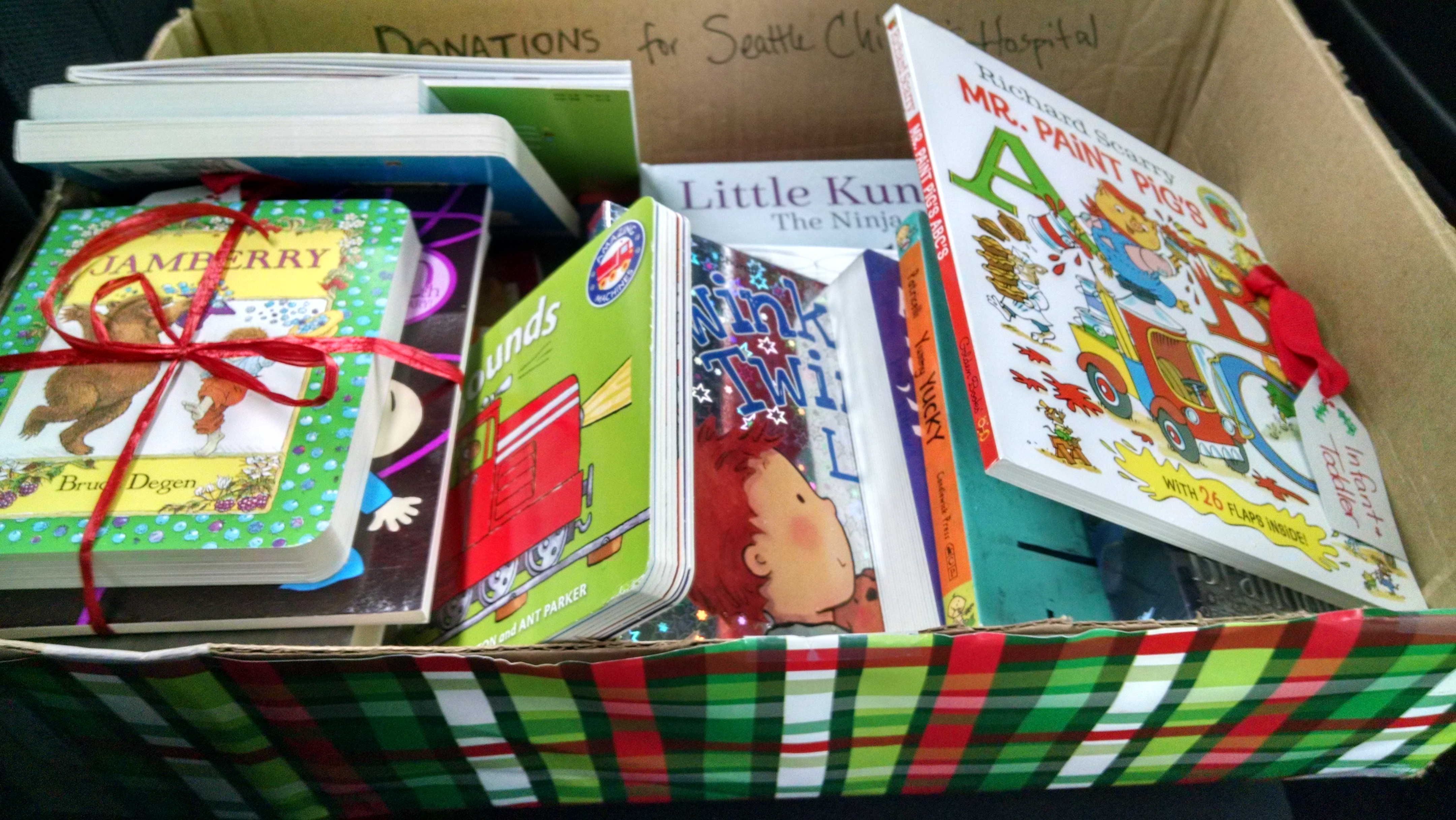 One of four boxes of donations from Queen Anne Book Company and its customers for Seattle Children's Hospital. Customers of Third Place Books also donated in the drive organized by The Neverending Bookshop.