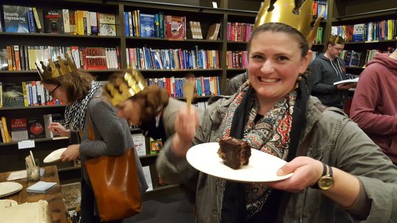 Kate from Team Sasquatch enjoys the cake baked by Ada's. (Sasquatch provided the SEABookstoreDay exclusive cookbook sampler.)