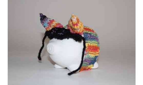 Stephanie Kallos's knit-enhanced piggy bank for Binc