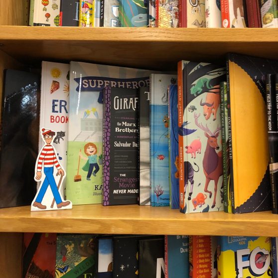Waldo standee on picture book shelf at Liberty Bay Books