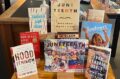 Juneteenth display of books like "Juneteenth for Maisie" annd "Four Hundred Souls"