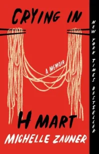 Cover of Crying in H Mart: Red background, noodles held between chopsticks forming an H. 